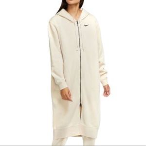 Nike Women’s long zip up fleece sweatshirt in cream.